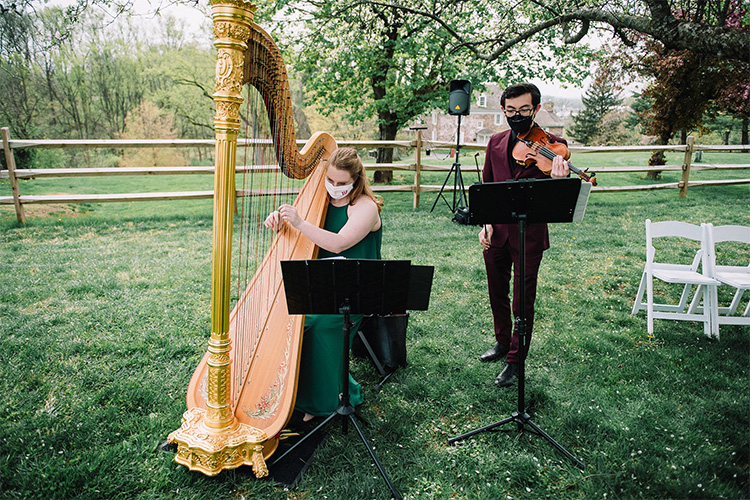 harpist and violinist perform at a wedding in Amsterdam, Netherlands